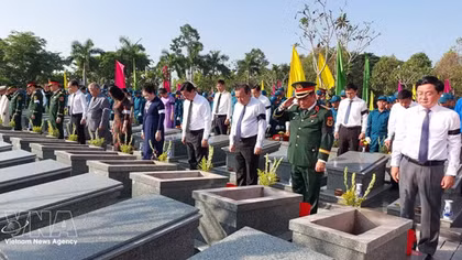 Memorial, burial held for 158 Vietnamese volunteer soldiers, experts recovered from Cambodia