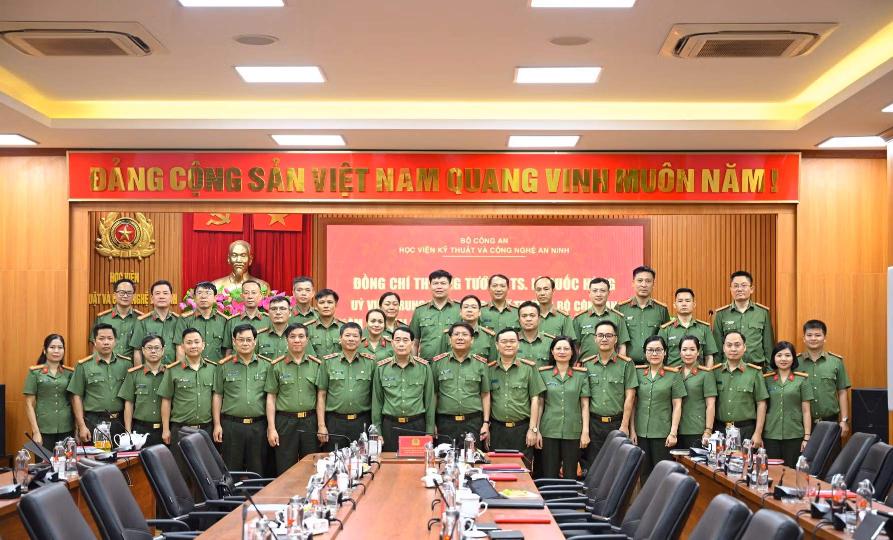 Delegates join group photo.