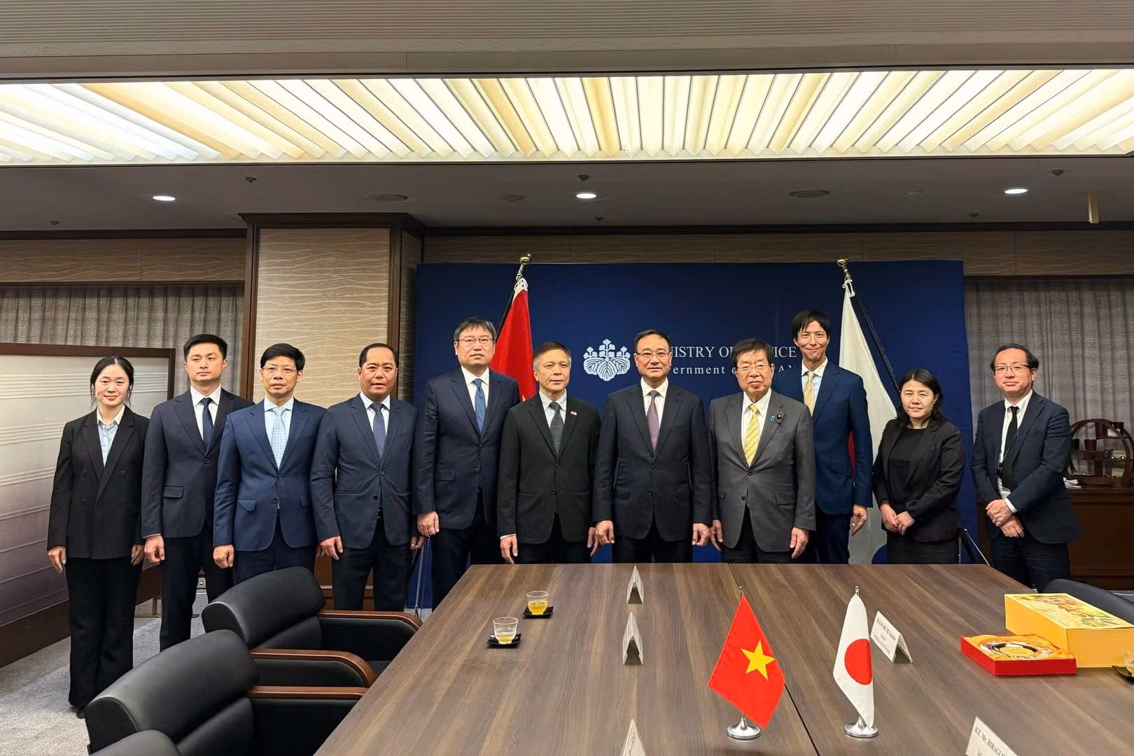 Delegates join group photo.