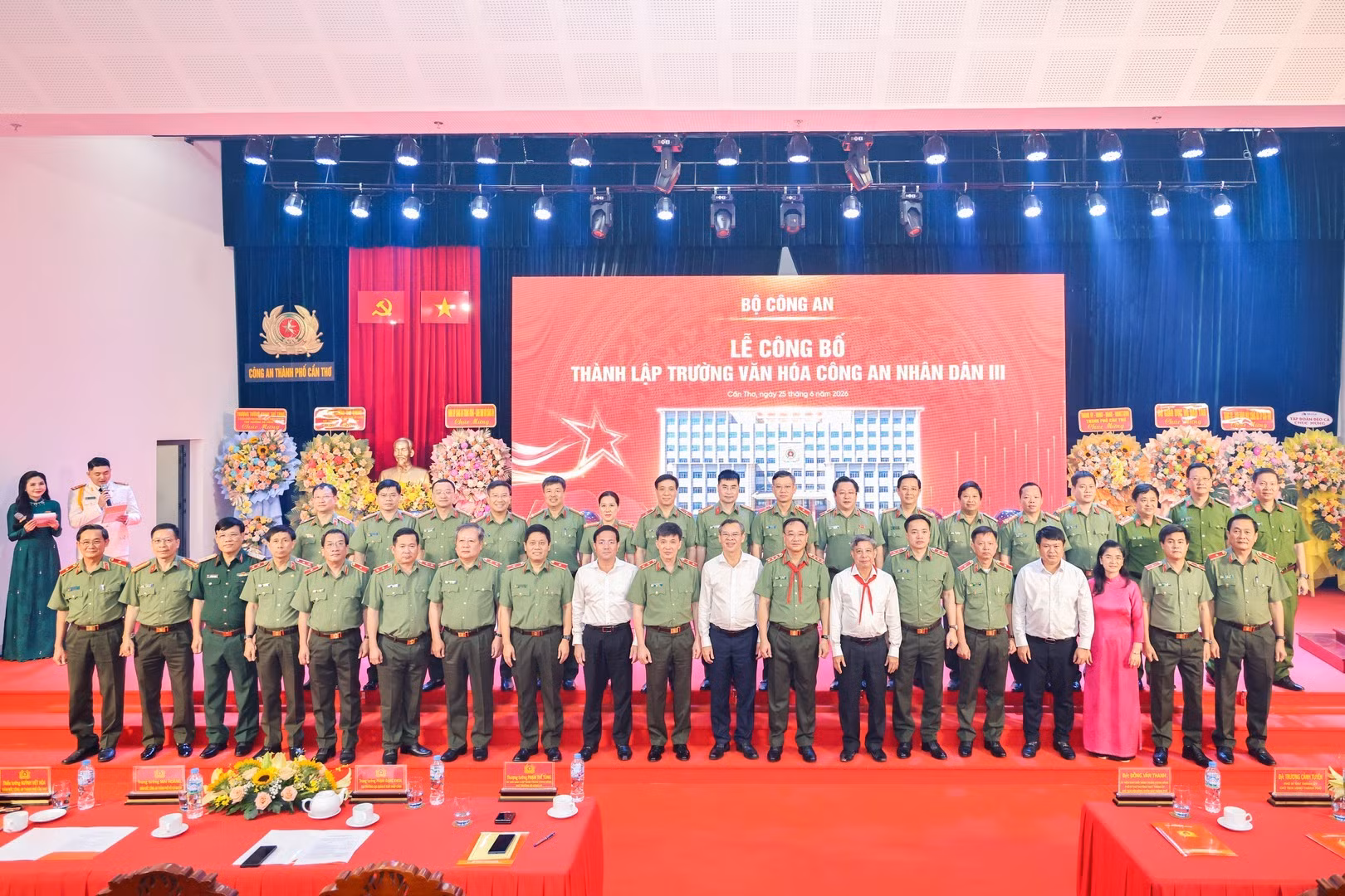 Delegates join group photo.