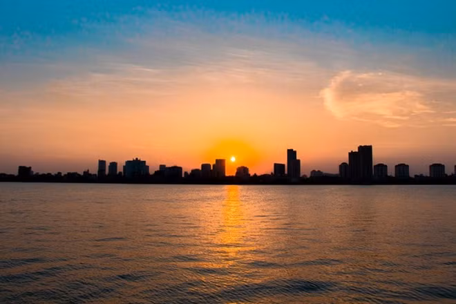 Elsewhere in the capital, West Lake is an ideal spot for young people to enjoy at sunset. Surrounding the lake are a number of other popular places such as Nghi Tam flower village and Tran Quoc pagoda. (Photo: Unsplash)