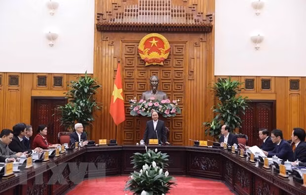 Prime Minister Nguyen Xuan Phuc has a working session with leaders of Binh Phuoc province on January 14. (Photo: VNA)