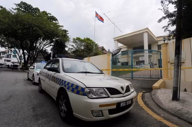 Police cars block the entrance of a sealed off North Korea embassy in Kuala Lumpur, Malaysia March 7, 2017. REUTERS/Lai Seng Sin