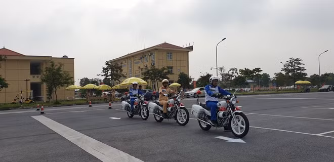 Traffic police competes in driving contest.