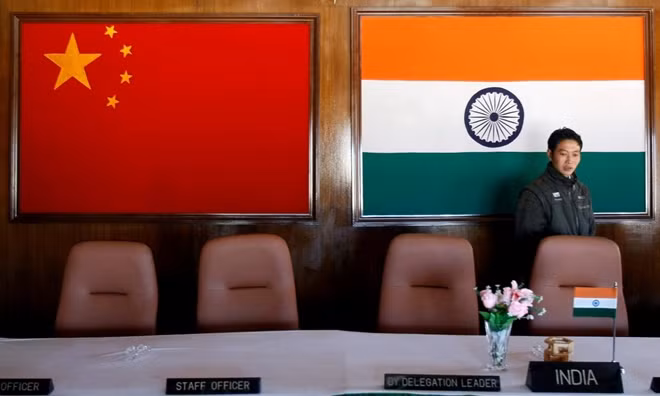 A man walks inside a conference room used for meetings between military commanders of China and India, at the Indian side of the Indo-China border at Bumla, in the northeastern Indian state of Arunachal Pradesh, November 11, 2009.