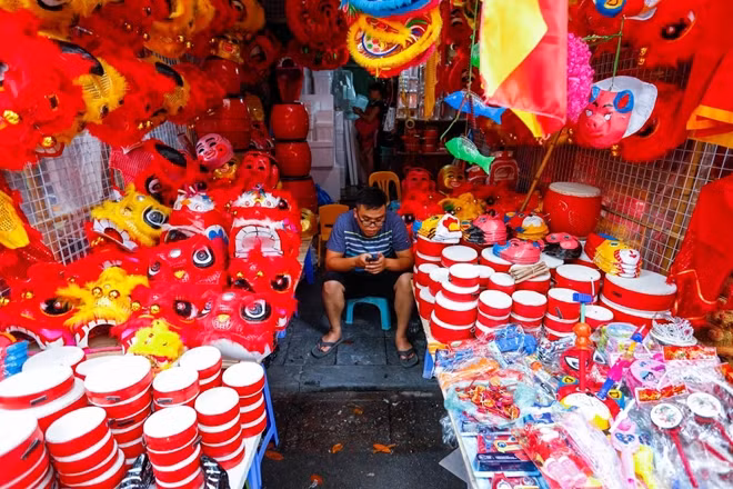 There are hundreds of lanterns, masks and paper lion heads in all shapes, colours and sizes.