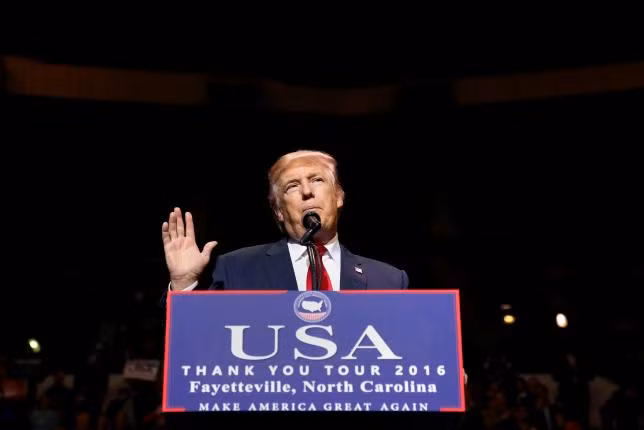 U.S. President-elect Donald Trump speaks at a USA Thank You Tour event at Crown Coliseum in Fayetteville, North Carolina, U.S., December 6, 2016. REUTERS/Shannon Stapleton.