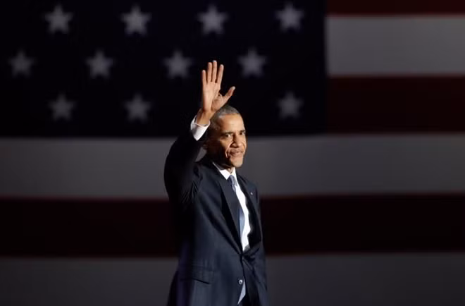 President Barack Obama acknowledges the crowd as he arrives to deliver his farewell address in Chicago, Illinois. REUTERS/John Gress