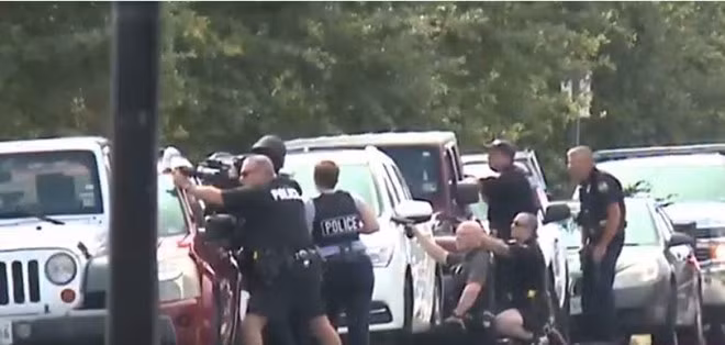 Disgruntled city worker kills 12 in Virginia beach resort; suspect also killed.