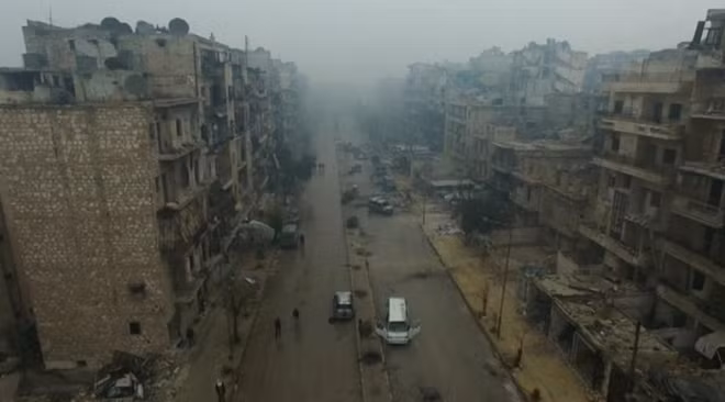 A still image from video taken December 13, 2016 of a general view of eastern Aleppo, Syria in the rain. REUTERS/via ReutersTV