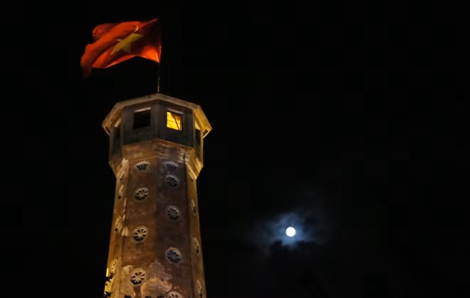 The supermoon and Hanoi’s Flag Tower.