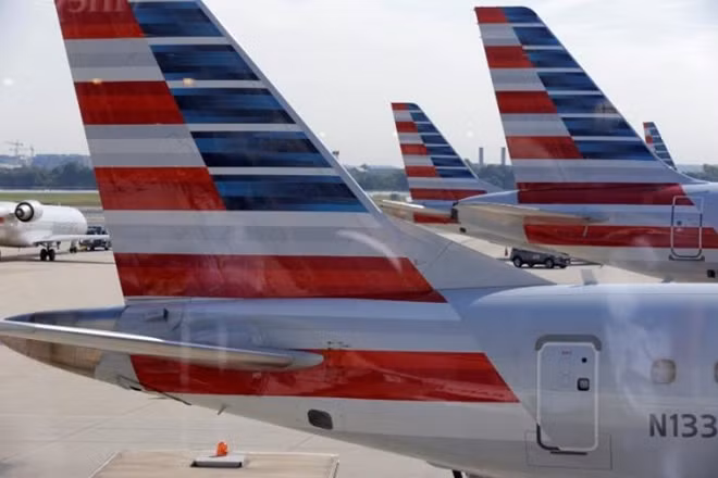 American Airlines aircraft are parked at Ronald Reagan Washington National Airport in Washington, U.S., August 8, 2016. REUTERS/Joshua Roberts/File Photo