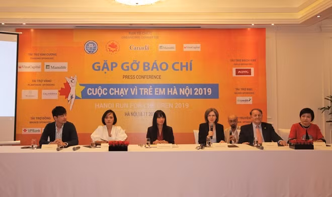 Delegates at the press conference in Hanoi on November 18.