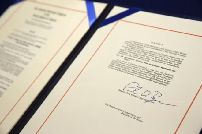 A bill repealing Obamacare sits on a desk after being signed by U.S. House Speaker Paul Ryan (R-WI) at the U.S. Capitol in Washington January 7, 2016. REUTERS/Jonathan Ernst