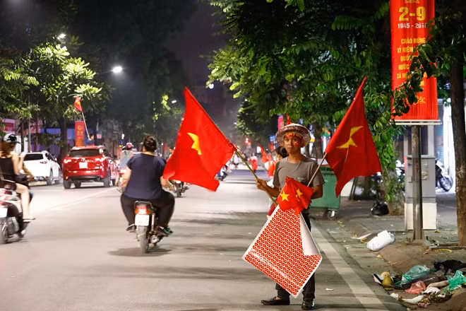 The streets were flooded with light flares, Vietnamese flags and cheering people.