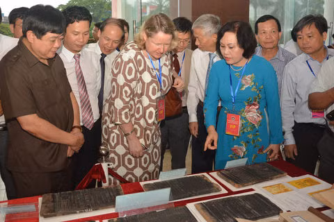 n the display are nearly 100 exhibits, including documents, books, pictures, translated versions and reproductions of the woodblocks.