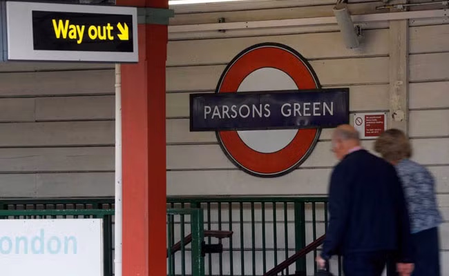 British police arrested an 18-year-old man in the southern port of Dover on Saturday in a “significant” development in the hunt for the culprits behind a London commuter train bombing that injured 30 people a day earlier.