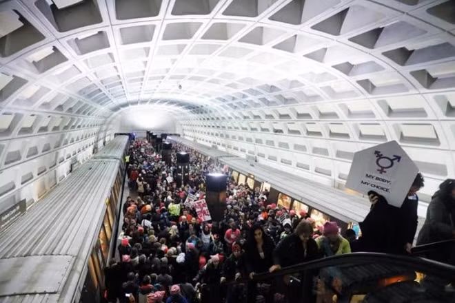 Demonstrators arrive via public transportation to take part in a 'Women's March' to protest the inauguration of Donald Trump's inauguration as the 45th president of the United States in Washington, January 21, 2017. REUTERS/Lucas Jackson