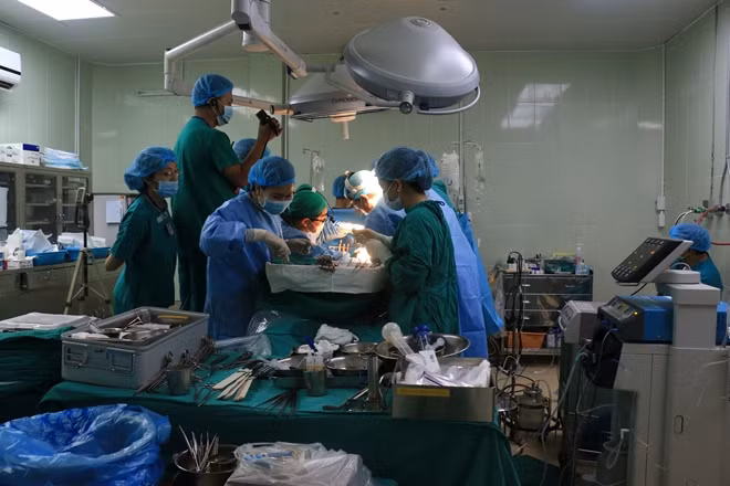 Doctor conducting liver transplant at Cho Ray Hospital.