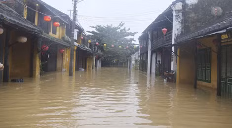 The ancient streets along the Hoai River were submerged in flood waters.