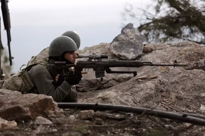 Turkish forces are seen at Mount Barsaya in northeast of Afrin, Syria January 28, 2018. REUTERS/ Khalil Ashawi