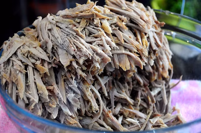 Through time, the dish has evolved with higher living standards. Instead of pig skin, southerners then added shredded pork.