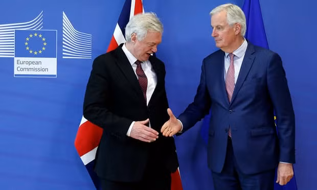 David Davis and Michel Barnier shake hands before Monday’s meeting in Brussels. Photograph: Francois Lenoir/Reuters David Davis and Michel Barnier shake hands before Monday’s meeting in Brussels. Photograph: Francois Lenoir/Reuters