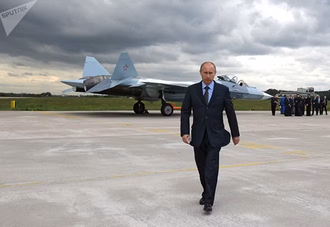© SPUTNIK/ ALEXEI DRUZHININ Prime Minister Vladimir Putin at the test if a T-50 fifth generation fighter
