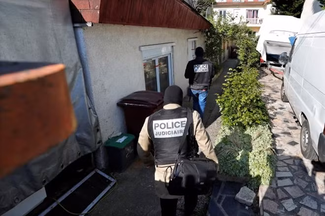 French police arrive at the house of the gunman killed in a shootout with police on the Champs Elysees Avenue, in the Paris suburb of Chelles, France, April 21, 2017. REUTERS/Charles Platiau