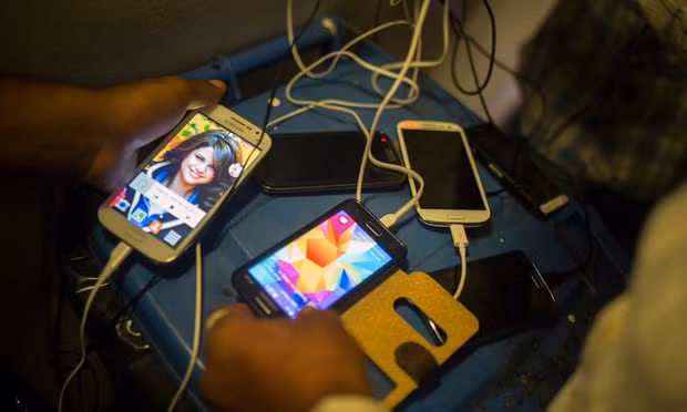 The discovery of niobium tungsten oxides raises the possibility of developing a smart phone battery that could be fully charged in minutes. Photograph: Santi Palacios/AP