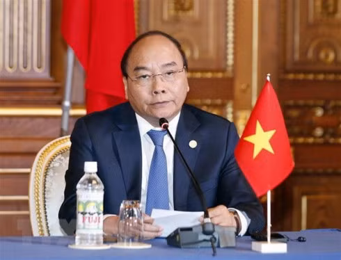 Prime Minister Nguyen Xuan Phuc addresses the joint press conference on the outcomes of the 10th Mekong-Japan Summit