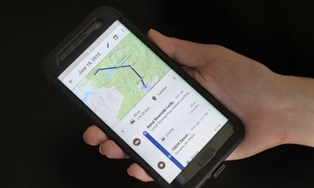 A mobile phone displays a user’s travels. Photograph: Seth Wenig/AP