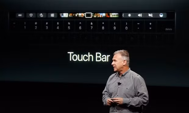 The Touch Bar is a customisable and context-sensitive OLED touchscreen positioned above the keyboard. Photograph: Stephen Lam/Getty Images