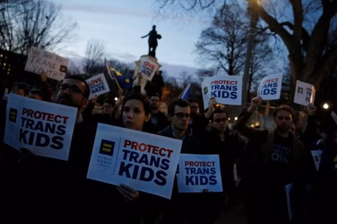 Transgender activists and supporters protest potential changes by the Trump administration in federal guidelines issued to public schools in defense of transgender student rights, near the White House in Washington, U.S. February 22, 2017. REUTERS/Jonathan Ernst