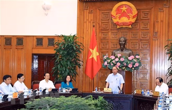 Prime Minister Nguyen Xuan Phuc speaks at the working session. (Source: VNA)
