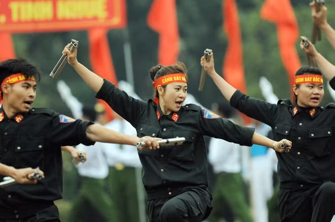 Female soldiers practicing nunchaku