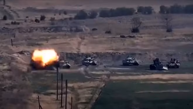 Armenian, Azeri forces clash again, at least 21 reported killed ảnh 1