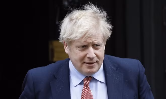 Britain's PM Johnson has coronavirus, self-isolates in Downing Street ảnh 1