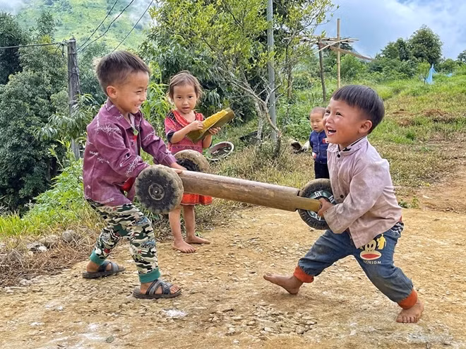 Childrens playing homemade tricycle...