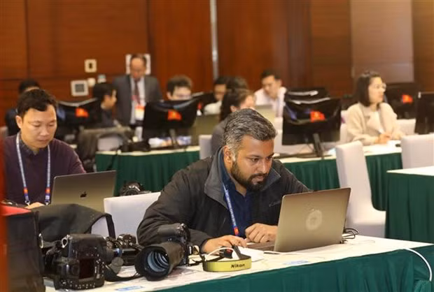 Foreign reporters are covering the 13th National Party Congress (Photo: VNA)