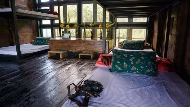There are six bunk beds on the first floor of the two-story house, which is more than 10 kilometers from the town center.