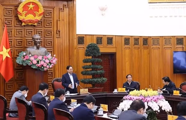 PM Pham Minh Chinh speaks at the meeting. (Photo: VNA)