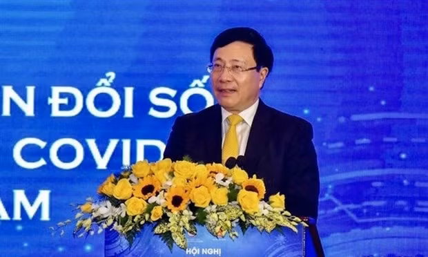 Deputy Prime Minister Pham Binh Minh speaks at the conference
