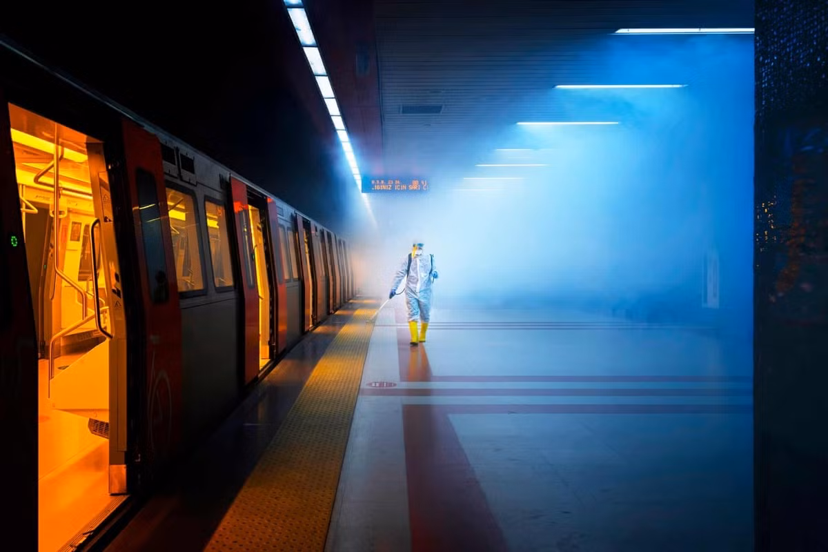 Another image taken by F Dilek Uyar is named as the winner in the street photography category. “Disinfection” represents a cinematic image which documents an employee of the health affairs unit of Ankara municipality wearing protective gear as they walk along the train platform as they thoroughly spray it with disinfectant.