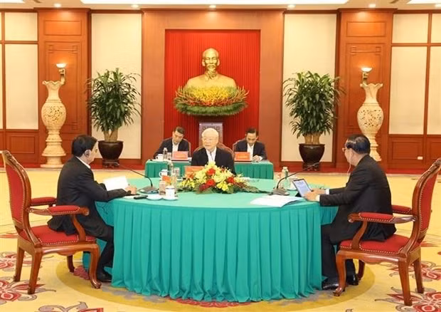 Party leaders of Vietnam, Cambodia, Laos hold high-level meeting in Hanoi -0