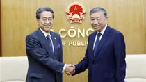 Minister To Lam receives Chairman of JBIC
