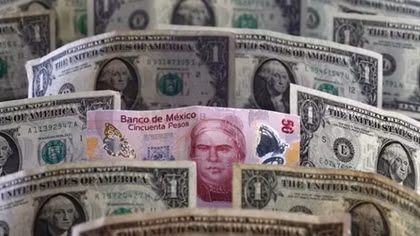 Dollar holds gains; Canadian dollar surge on NAFTA relief