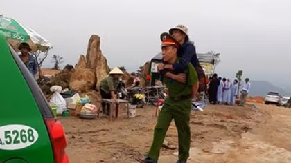 Police cadet carried a disabled on his back to mountain peak