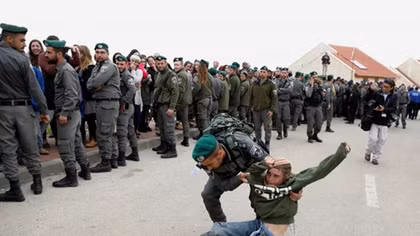 Israel removes settlers from homes on private Palestinian land