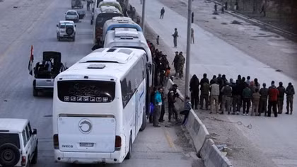 As Syrian rebels quit Ghouta, Douma stands alone